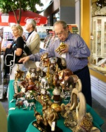 Shop owner selects one of his elephants to make a present to the Mayor of Nicosia